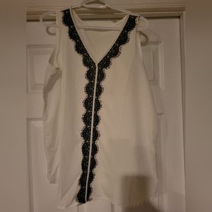 Ricki's white blouse